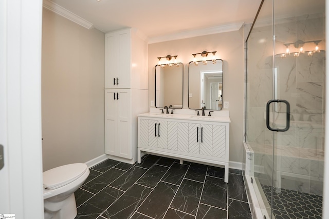 bathroom featuring toilet, crown molding, a shower with shower door, and vanity