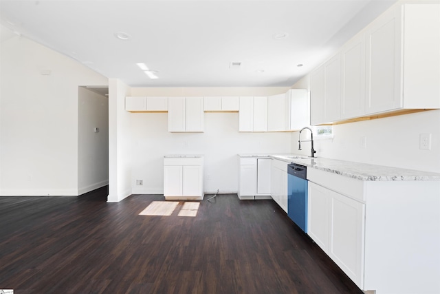 kitchen featuring dark wood-type flooring, stainless steel dishwasher, white cabinets, and sink