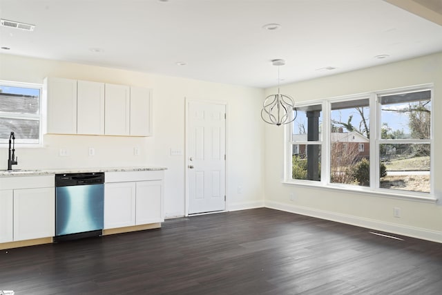 kitchen with hanging light fixtures, white cabinets, dishwasher, and a chandelier