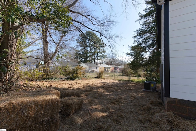 view of yard featuring central AC