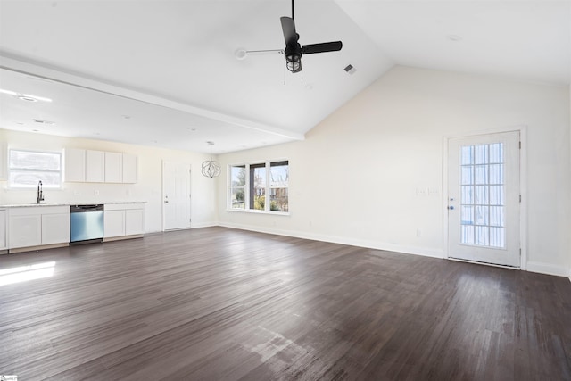 unfurnished living room with high vaulted ceiling, dark hardwood / wood-style floors, sink, and ceiling fan with notable chandelier