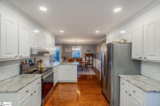 kitchen featuring white cabinetry, dark wood-type flooring, pendant lighting, and stainless steel appliances