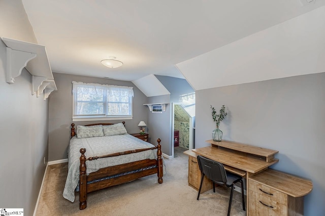 bedroom with lofted ceiling and light carpet