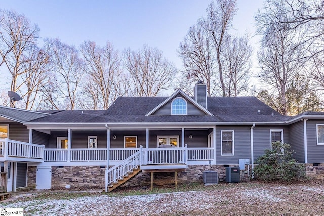 view of front of house featuring central AC and a porch