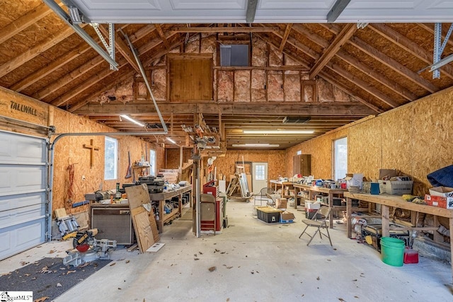 garage with a workshop area