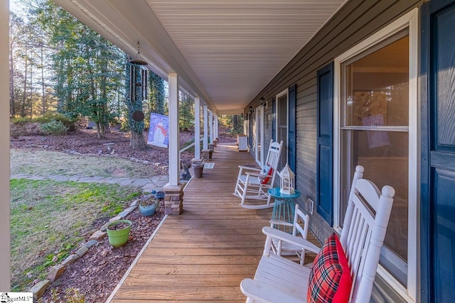 wooden terrace with covered porch