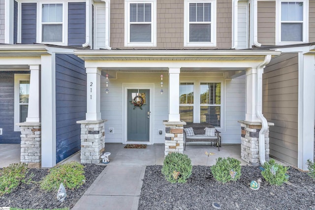 entrance to property with a porch