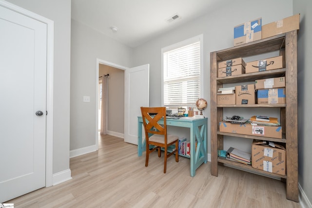 office space featuring light hardwood / wood-style floors