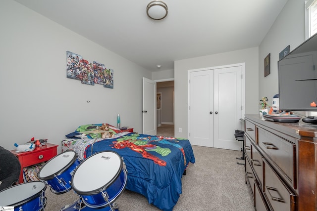 carpeted bedroom featuring a closet