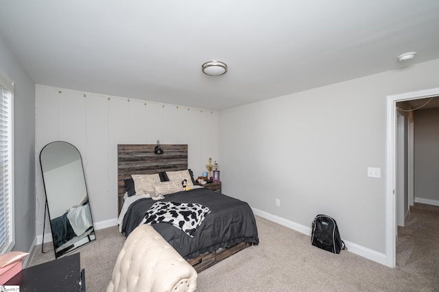 bedroom with light colored carpet