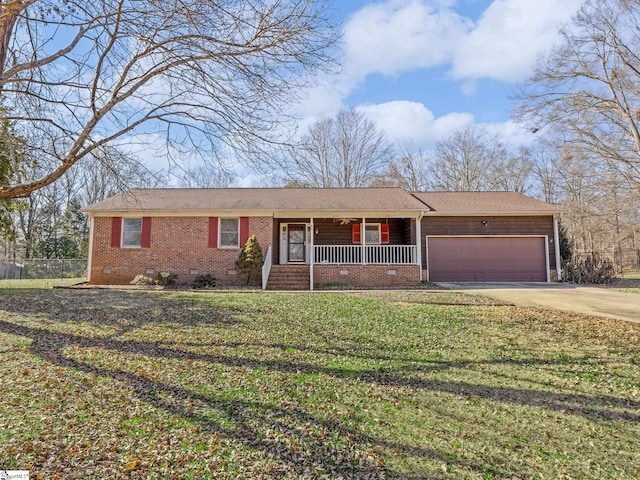 single story home featuring a front yard, covered porch, and a garage