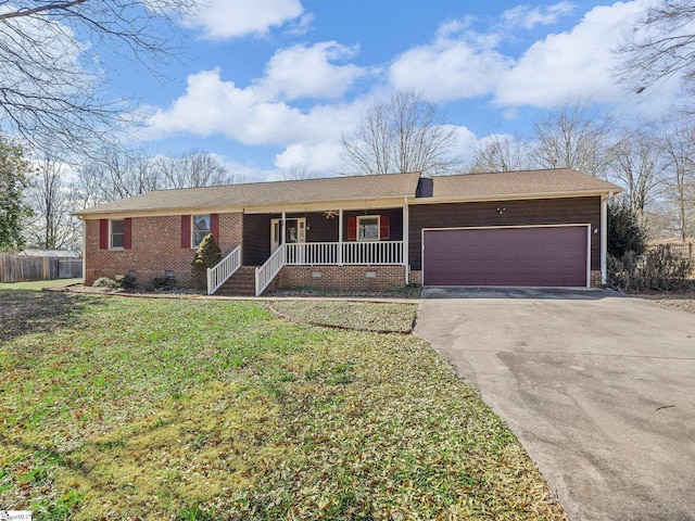 ranch-style house featuring a front lawn, a garage, and a porch