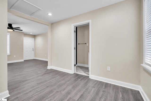 empty room featuring ceiling fan and wood-type flooring