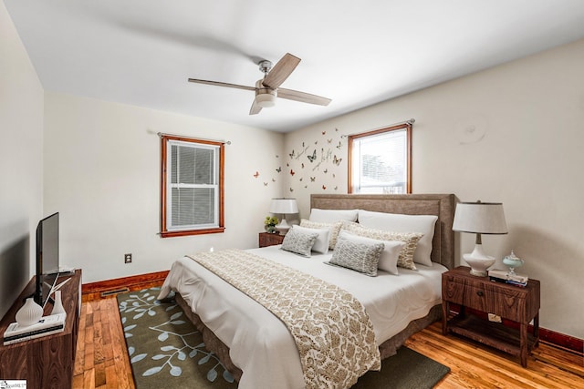 bedroom featuring ceiling fan and light hardwood / wood-style floors