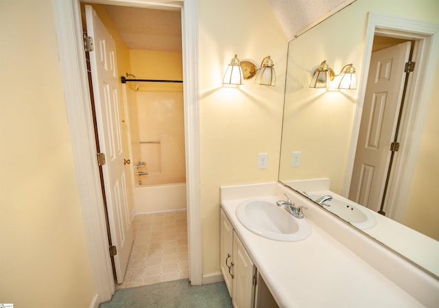 bathroom with vanity and bathing tub / shower combination