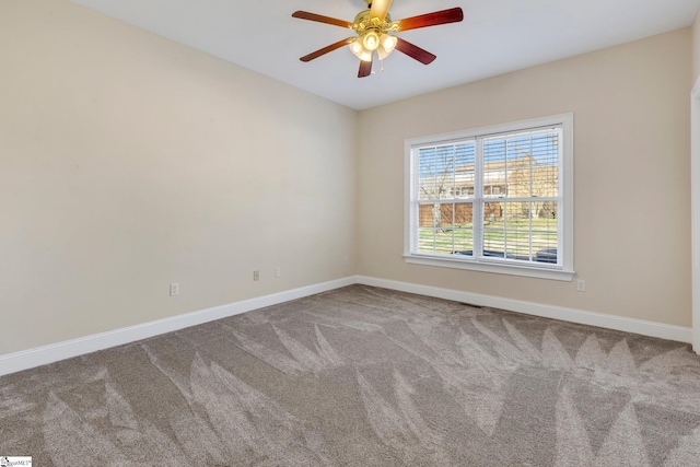 empty room with carpet and ceiling fan