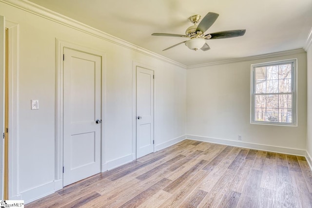 unfurnished bedroom with ceiling fan, ornamental molding, and light wood-type flooring