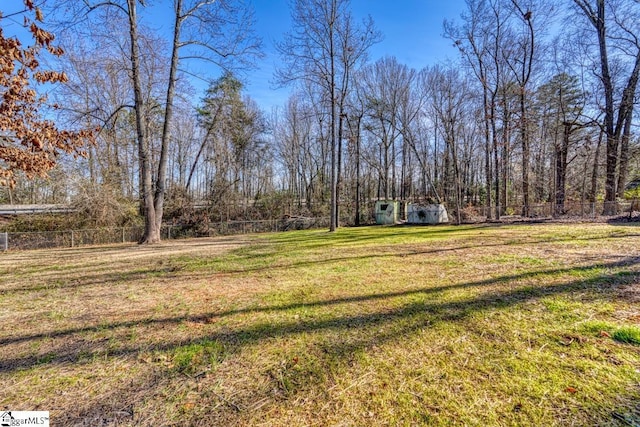 view of yard with a storage shed