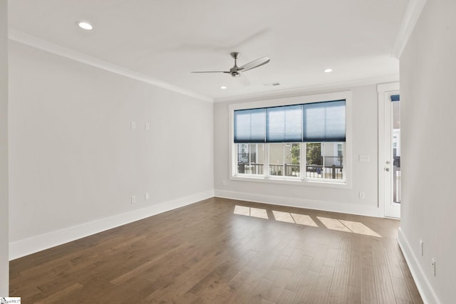 empty room with ceiling fan, wood-type flooring, and ornamental molding