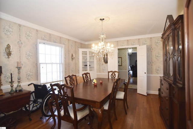 dining space with ornamental molding, dark hardwood / wood-style floors, and a chandelier