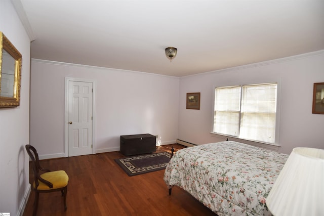 bedroom with hardwood / wood-style flooring, a baseboard radiator, and ornamental molding