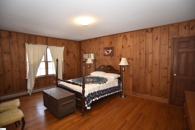 bedroom featuring dark hardwood / wood-style flooring