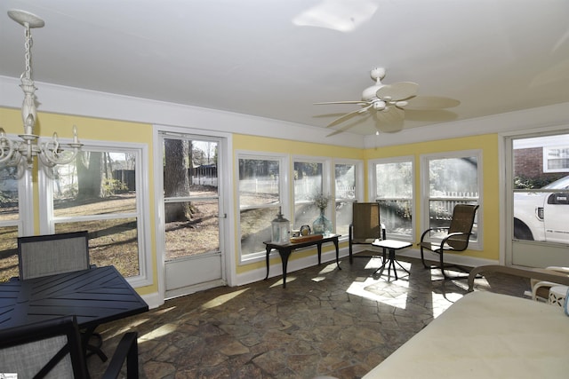 sunroom with ceiling fan