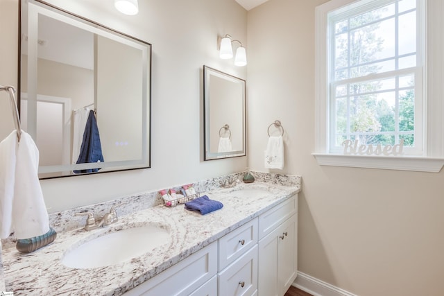 bathroom featuring vanity