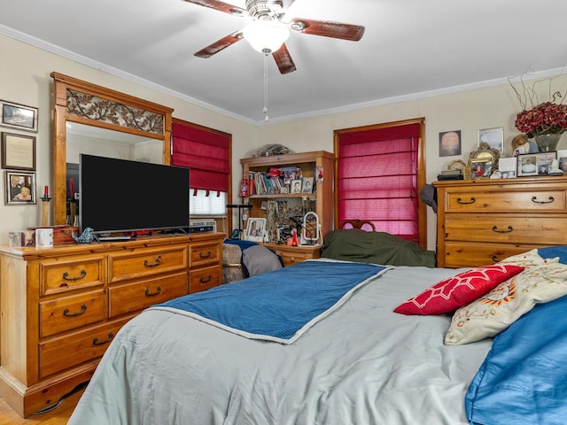 bedroom featuring ceiling fan and crown molding