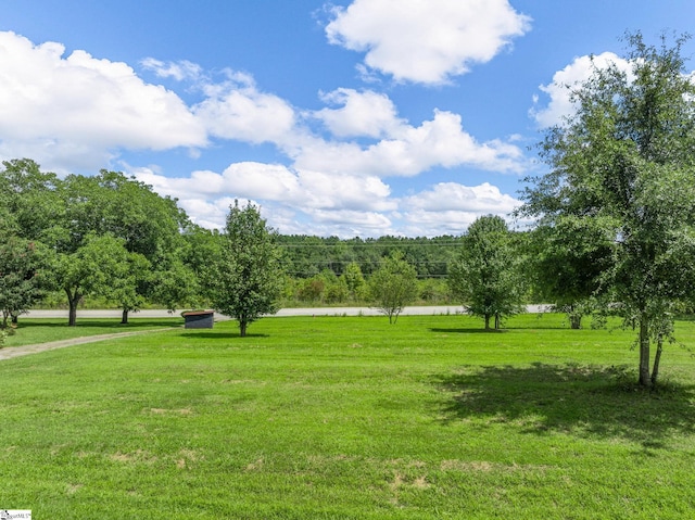 surrounding community featuring a lawn