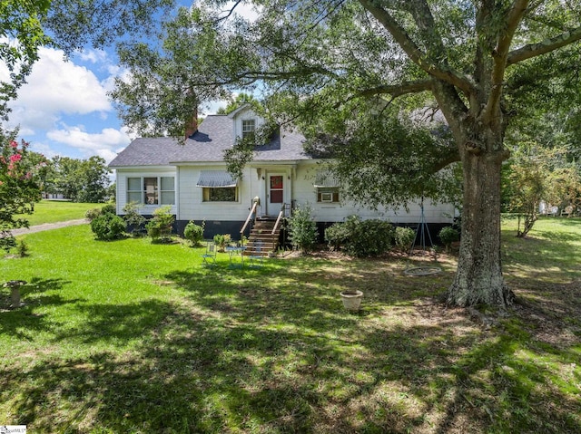 new england style home with a front yard