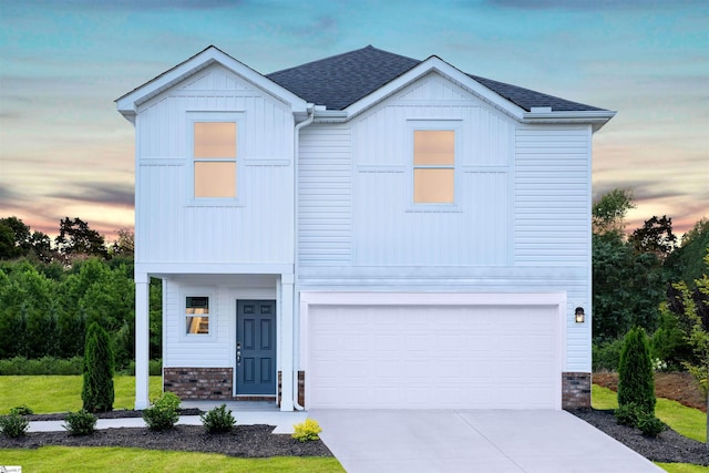 view of front of home with a garage