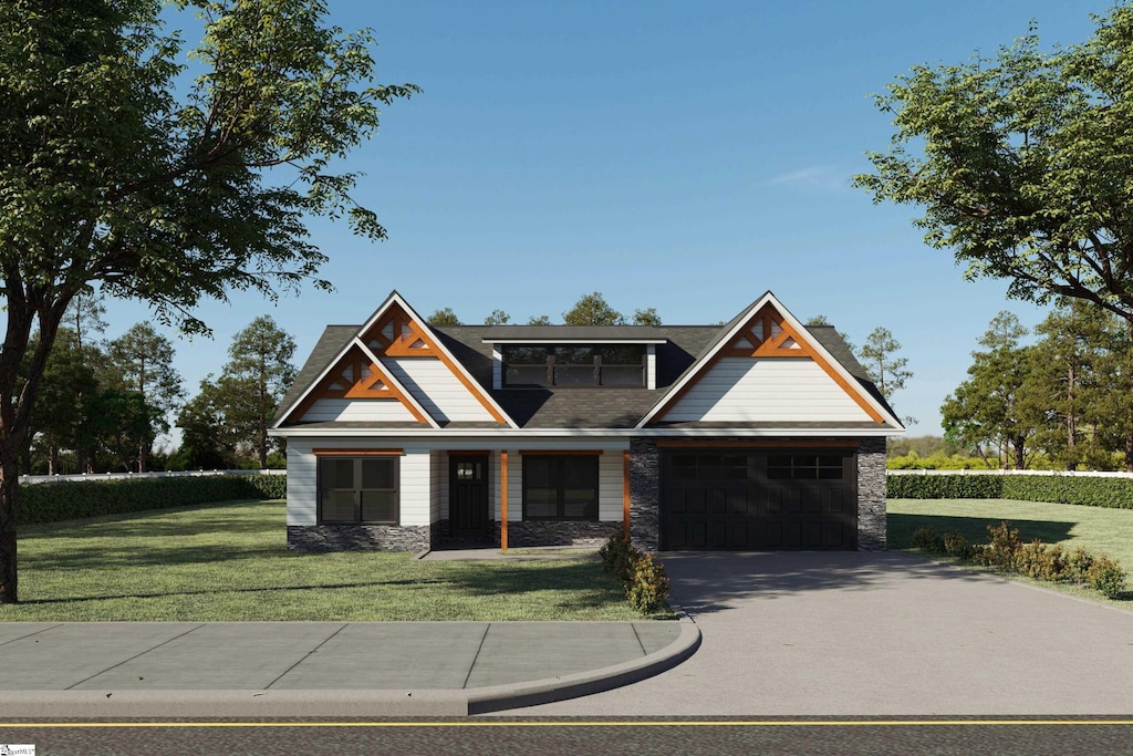 craftsman inspired home with a front lawn and a garage