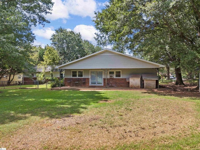 ranch-style home with a front yard