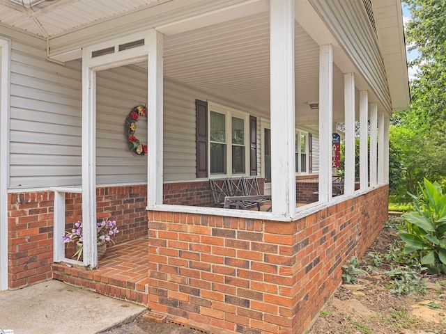 exterior space featuring covered porch