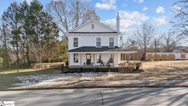 farmhouse-style home featuring a porch