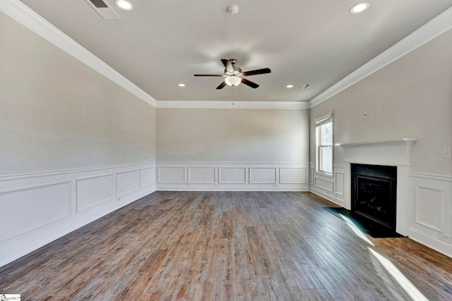 unfurnished living room featuring crown molding, ceiling fan, and hardwood / wood-style floors