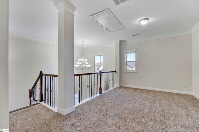 empty room with crown molding and carpet flooring