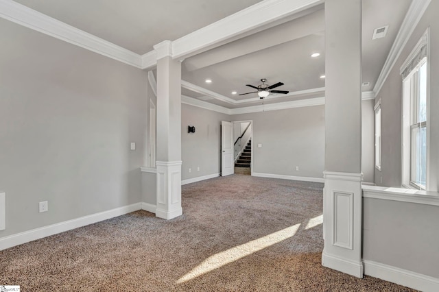 unfurnished living room featuring ceiling fan, ornamental molding, carpet flooring, and decorative columns