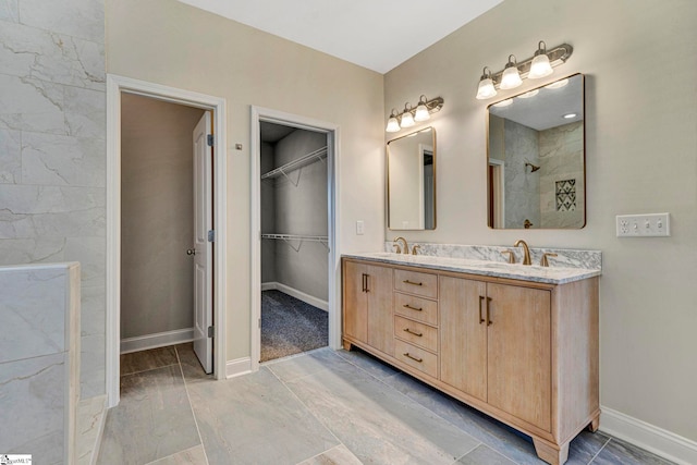 bathroom featuring vanity and walk in shower