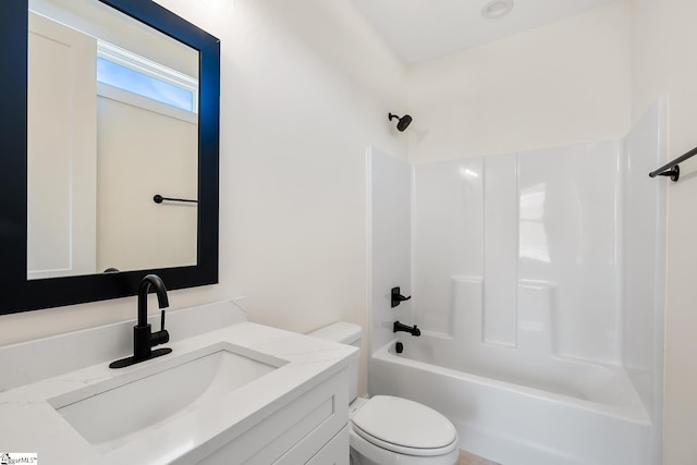 full bathroom with washtub / shower combination, toilet, and vanity