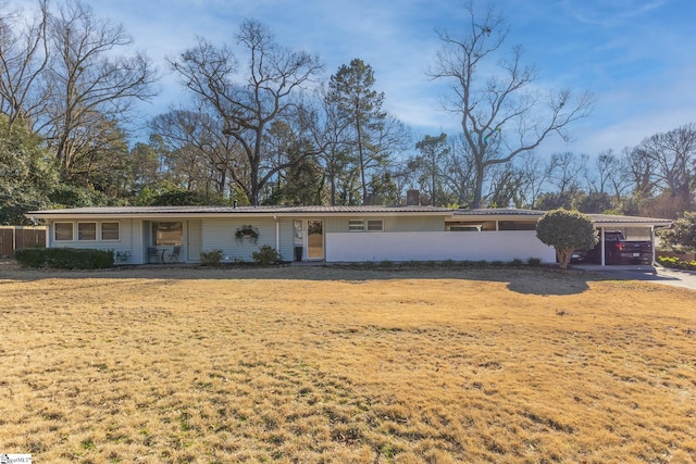 ranch-style home with a carport