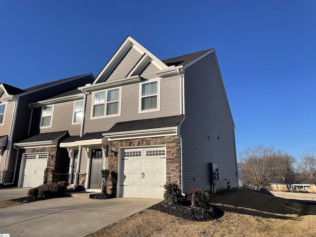 view of front of property featuring a garage