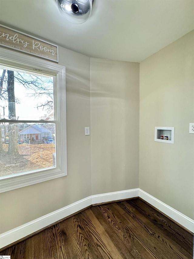 washroom featuring hardwood / wood-style flooring and hookup for a washing machine