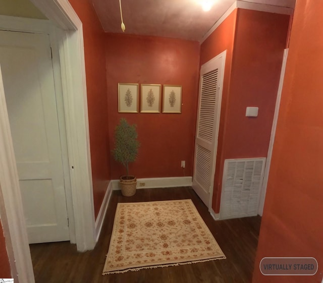 hall with dark hardwood / wood-style floors