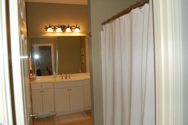 bathroom with vanity and tile patterned flooring