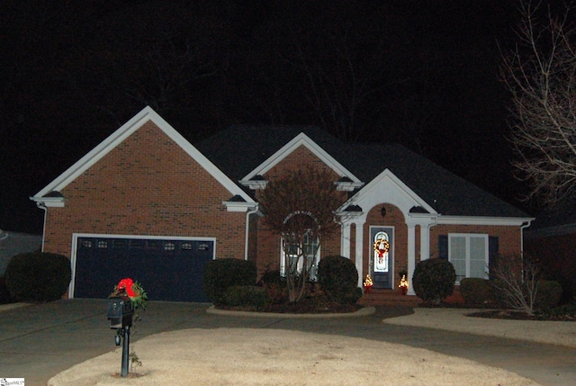 view of front of home featuring a garage