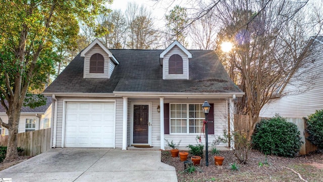 new england style home with a garage