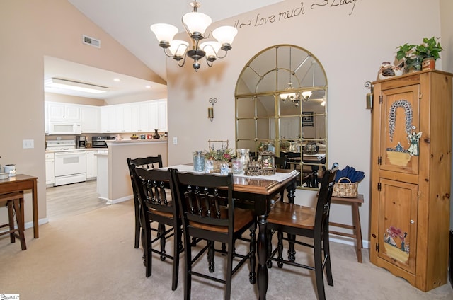 dining area featuring vaulted ceiling, light carpet, and a notable chandelier