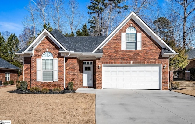 front facade featuring a garage and central AC